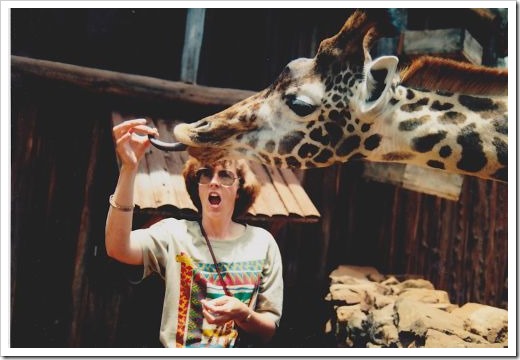 Shelley Feeding a Giraffe